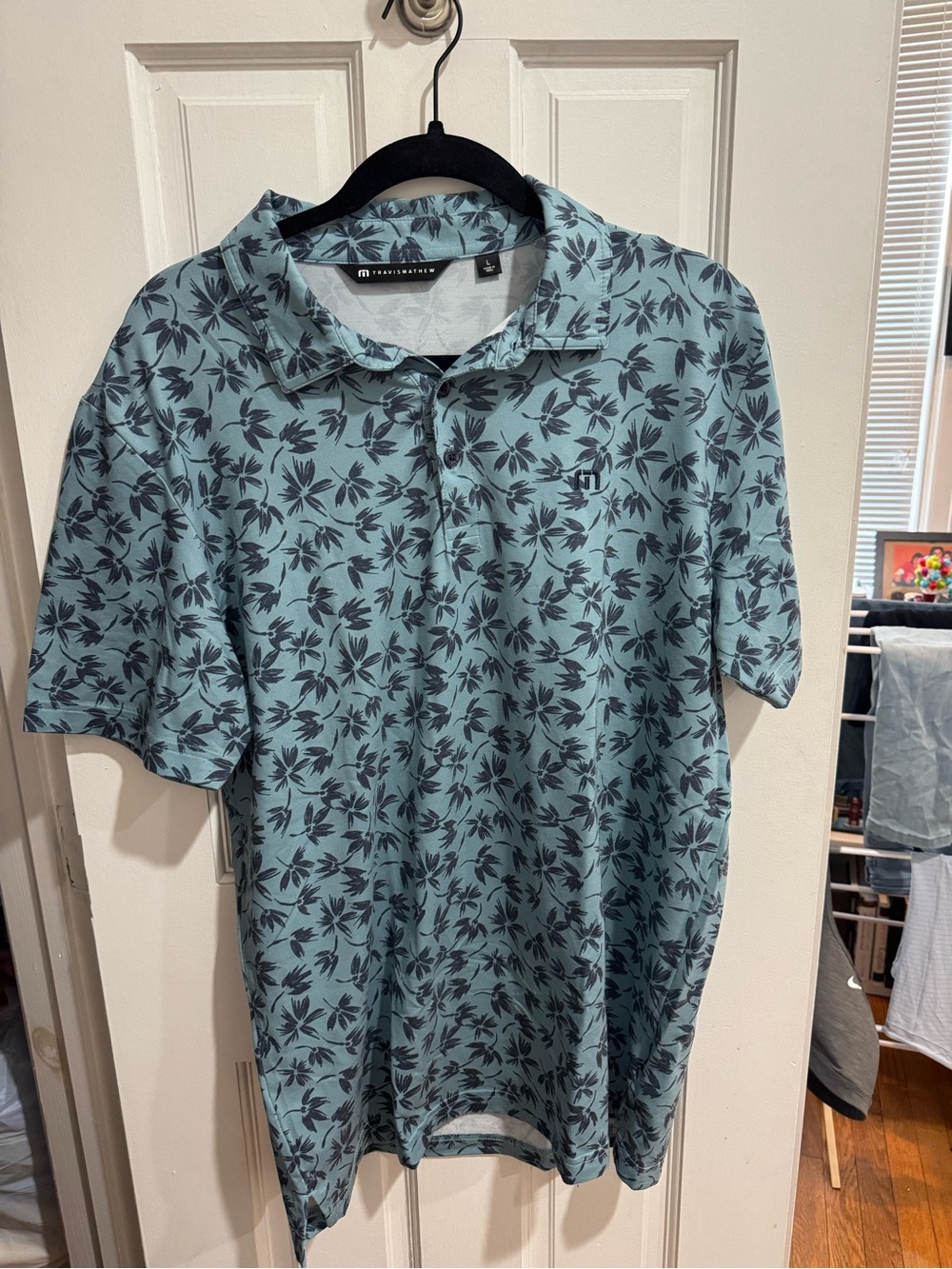 Travis Mathew Teal Polo with Dark Floral Print